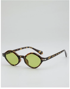 Detail of tortoise frame sunglasses with light green lenses and silver metal accents
