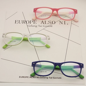 Three candy-colored kids' glasses frames in pink, white, and navy blue on a white background