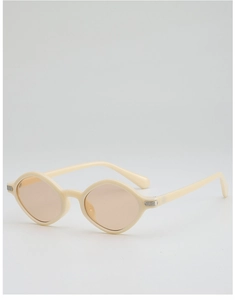 Detail view of cream polygon sunglasses with tinted lenses and silver temple accents