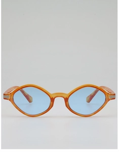 Close-up of orange tortoiseshell geometric frames with light blue lenses and silver accents