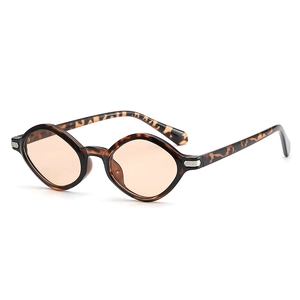Retro tortoise shell irregular sunglasses with translucent orange lenses for women
