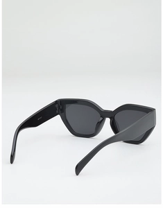 Detailed view of black thick-frame cat-eye sunglasses with model number WF 32107 printed