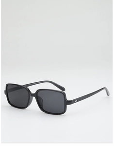 Detail view of black square sunglasses featuring silver rivet accents and glossy finish