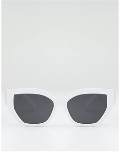 Detailed front view of white cat-eye sunglasses with thick frames and dark lenses