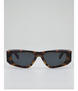 Close-up of retro tortoiseshell geometric frame sunglasses with dark grey protective lenses