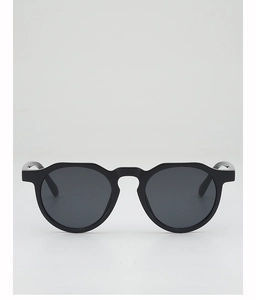 Detail of round irregular black sunglasses frame with premium acetate texture