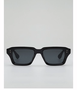Close-up of black square sunglasses frame featuring double silver rivet decorations