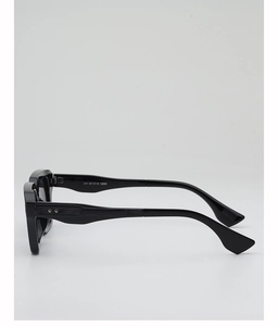 Detail shot of black chunky frames with silver studs and visible size model specifications
