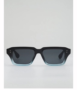 Close-up of black to blue gradient square frames with silver studs and dark gray lenses