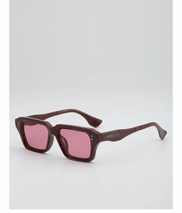Detail of burgundy square frame sunglasses with pink lenses and silver rivet accents