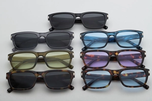 Detail view of retro rectangle sunglasses in multiple colors and textures with lens specs
