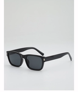 Detail of black rectangular sunglasses featuring silver accents and gray lenses
