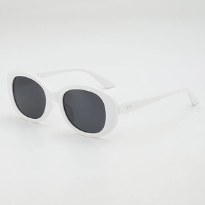 Lunettes de soleil ovales blanches rétro avec monture épaisse et verres foncés tendance