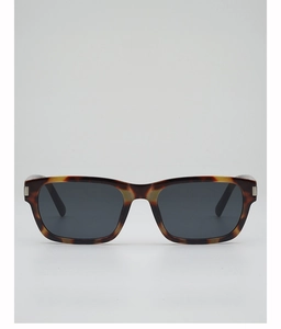 Front view of olive green and tortoiseshell rectangle sunglasses with silver hinge detail