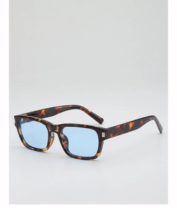 Close-up of vintage square tortoiseshell sunglasses with light blue lenses and silver metal trim