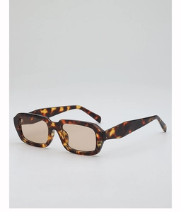 Detail of tortoiseshell rectangle sunglasses with light brown lenses and sturdy frame