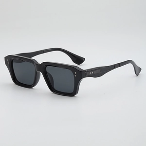 Retro square black sunglasses with silver rivets and dark grey lenses for street style