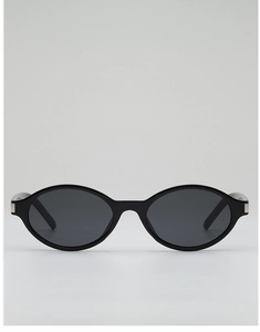 Detail of oval vintage sunglasses with silver metal hinges and black glossy frames