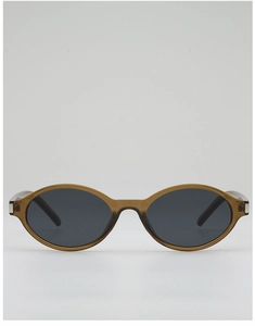Detail of oval vintage sunglasses with amber translucent frames and silver metal accents