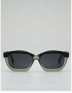 Front view of two-tone square sunglasses with black textured top and clear green bottom