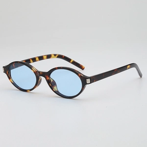 Retro oval sunglasses with tortoise shell frames and light blue lenses from a top view