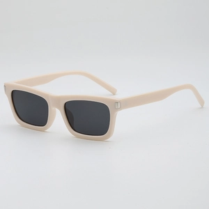 Chic vintage square frame sunglasses in cream beige with dark lenses and silver rivets
