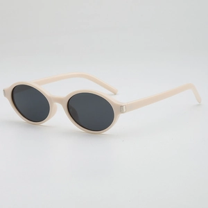 Vintage oval sunglasses with off-white frames and dark grey lenses for a retro chic style