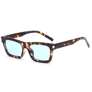 Retro rectangular sunglasses with tortoise frame and light blue lenses from a side view