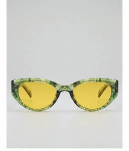 Close-up of green marble pattern cat-eye sunglasses with yellow tinted lenses