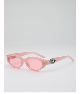 Detailed view of pink sunglasses with silver metal temple decor and white crystal inlay