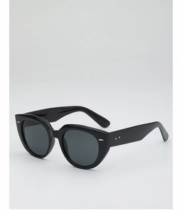 Detail of black cat-eye sunglasses with polished frames and silver hinge accents