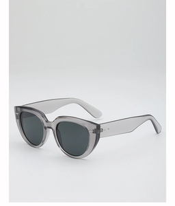 Detail of translucent gray frames and dark UV400 lenses on vintage oversized sunglasses