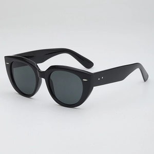 Classic black oversized cat eye sunglasses with silver rivets and UV400 lenses