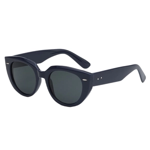 Retro oversized navy blue cat-eye sunglasses with UV400 lenses and metallic wing accents