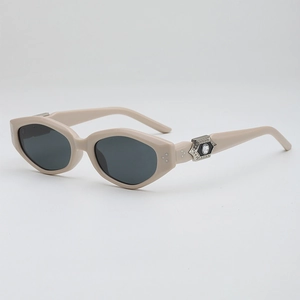 Retro beige polygon sunglasses with silver rhinestone detail and dark lenses