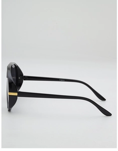 Detail view of bold black pilot sunglasses with gold metal accents and model CY3817