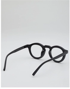 Detail view of glossy black round frames showing the internal temple model number CY5022