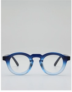 Front detail of round glasses frames with blue gradient finish and keyhole bridge