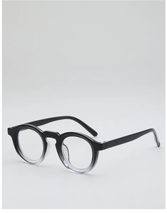 Detail of round black glasses frame with minimalist retro design and clear lenses
