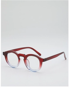 Detail showing the red to transparent gradient design on round eyeglass frames