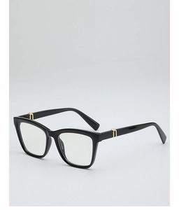 Detail of black square glasses frame with golden metal hinge accent on white background