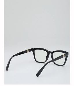 Detailed back view of square black eyeglass frames with gold vertical metal accents