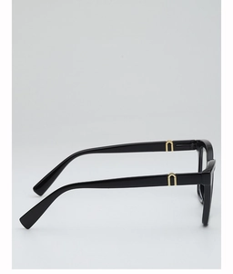 Detail view of black square eyeglass frames with gold U-shaped metal hinge accents