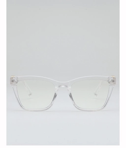 Close-up of transparent square frames featuring delicate light gold hinge accents