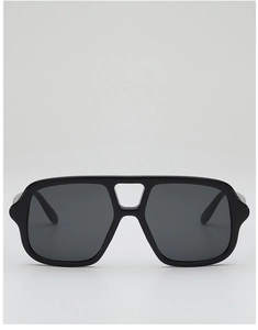 Front view of black oversized double bridge sunglasses with dark lenses on white background