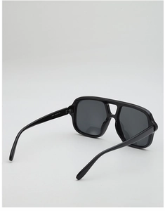 Detailed view of black double-bridge sunglasses showing interior arm model code 3988