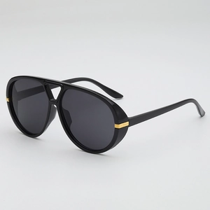Classic black aviator sunglasses with double bridge and gold metal temple accents