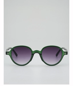 Detail view of round green transparent sunglasses with gradient purple lenses and silver rivets