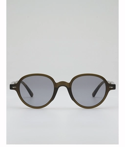 Close-up of olive green translucent round sunglasses with silver arrow metal rivets