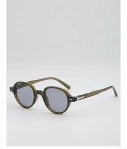 Detail of retro olive green round sunglasses with grey lenses and metal hinge accents